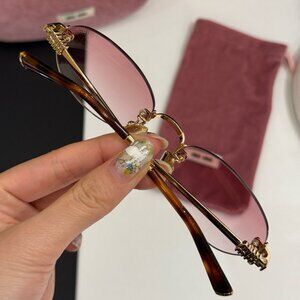 Miu Miu Eyewear oval-frame sunglasses